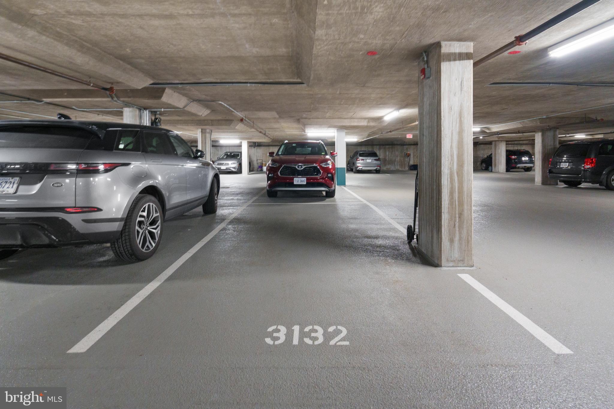 11990 Market Street, Unit 813 Reston, VA 20190 - Photo 35 of 48 a view of parking garage with cars