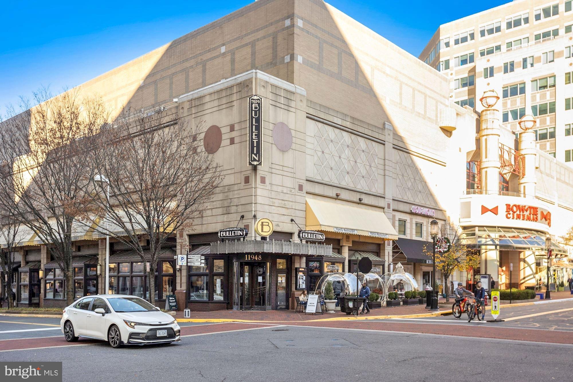 11990 Market Street, Unit 813 Reston, VA 20190 - Photo 44 of 48 a car parked in front of a building