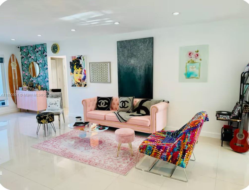 9240 Byron Avenue Surfside, FL 33154 - Photo 3 of 27 a living room with furniture and wooden floor