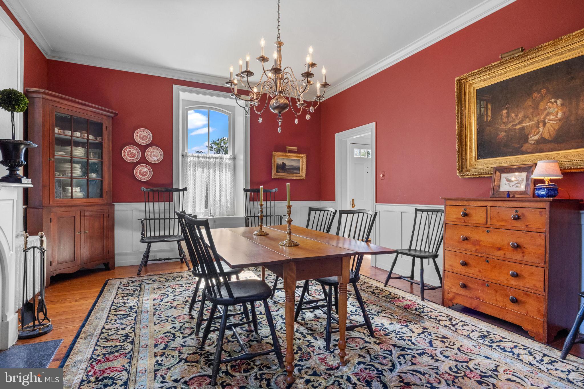 411 East Mill Road Flourtown, PA 19031 - Photo 22 of 62 a view of a dining room with furniture and chandelier