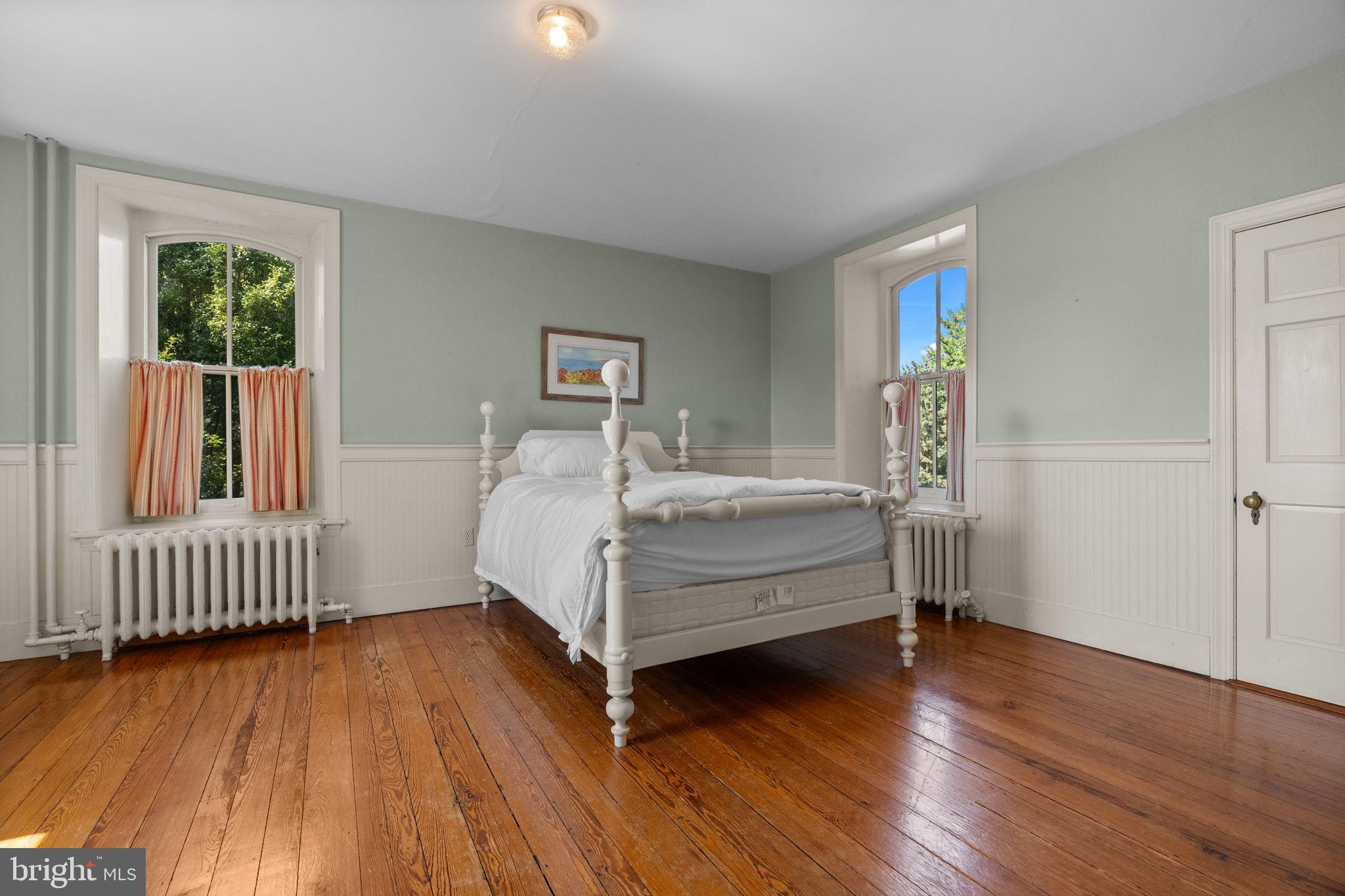 411 East Mill Road Flourtown, PA 19031 - Photo 23 of 62 a bedroom with a bed and a window