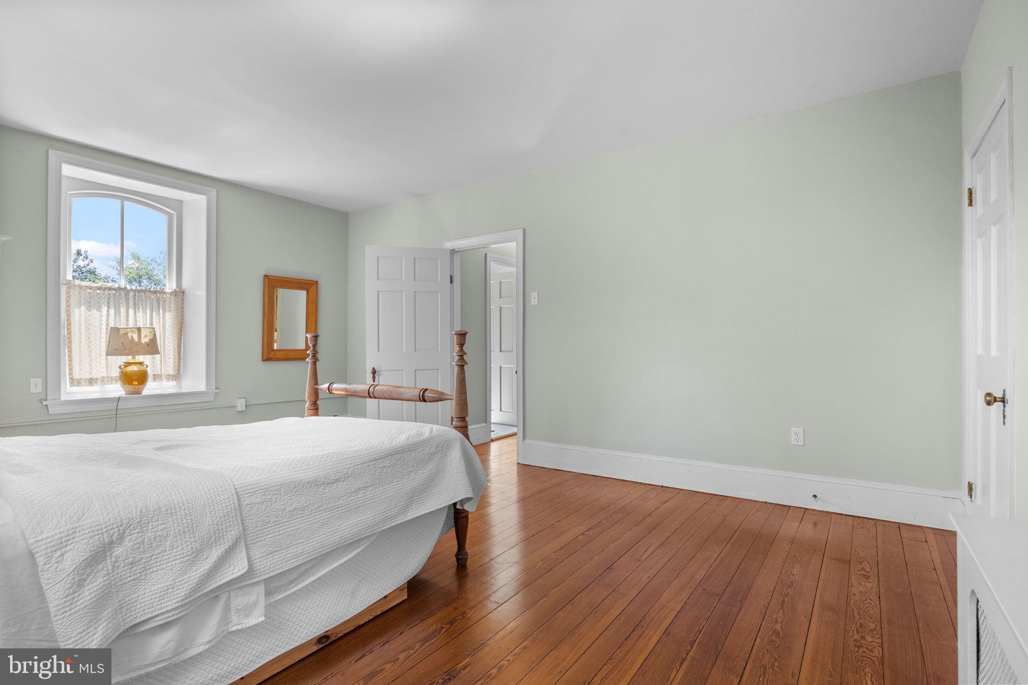 411 East Mill Road Flourtown, PA 19031 - Photo 26 of 62 a bedroom with a bed and a window