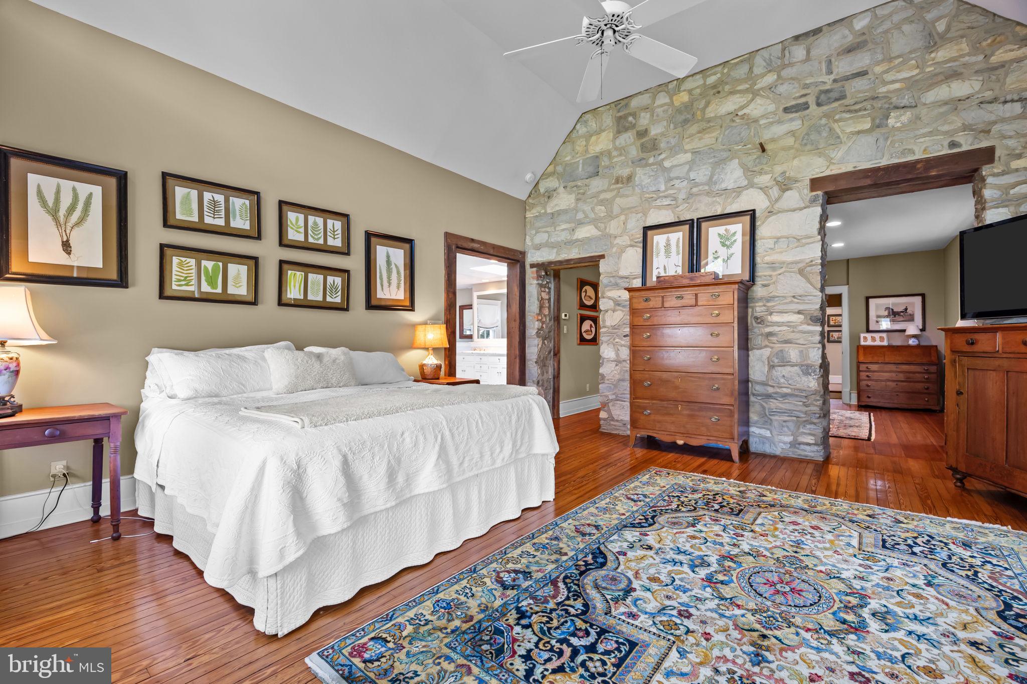 411 East Mill Road Flourtown, PA 19031 - Photo 32 of 62 a bedroom with a bed and a dresser