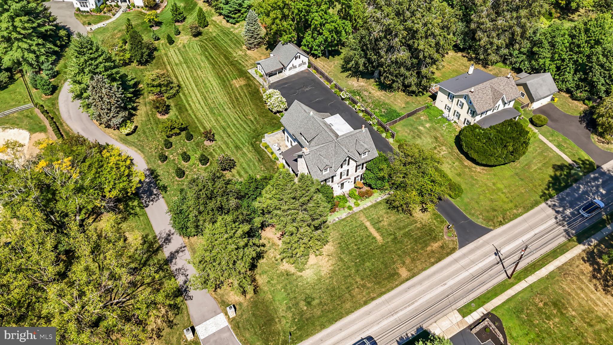 411 East Mill Road Flourtown, PA 19031 - Photo 54 of 62 an aerial view of residential house with outdoor space and street view