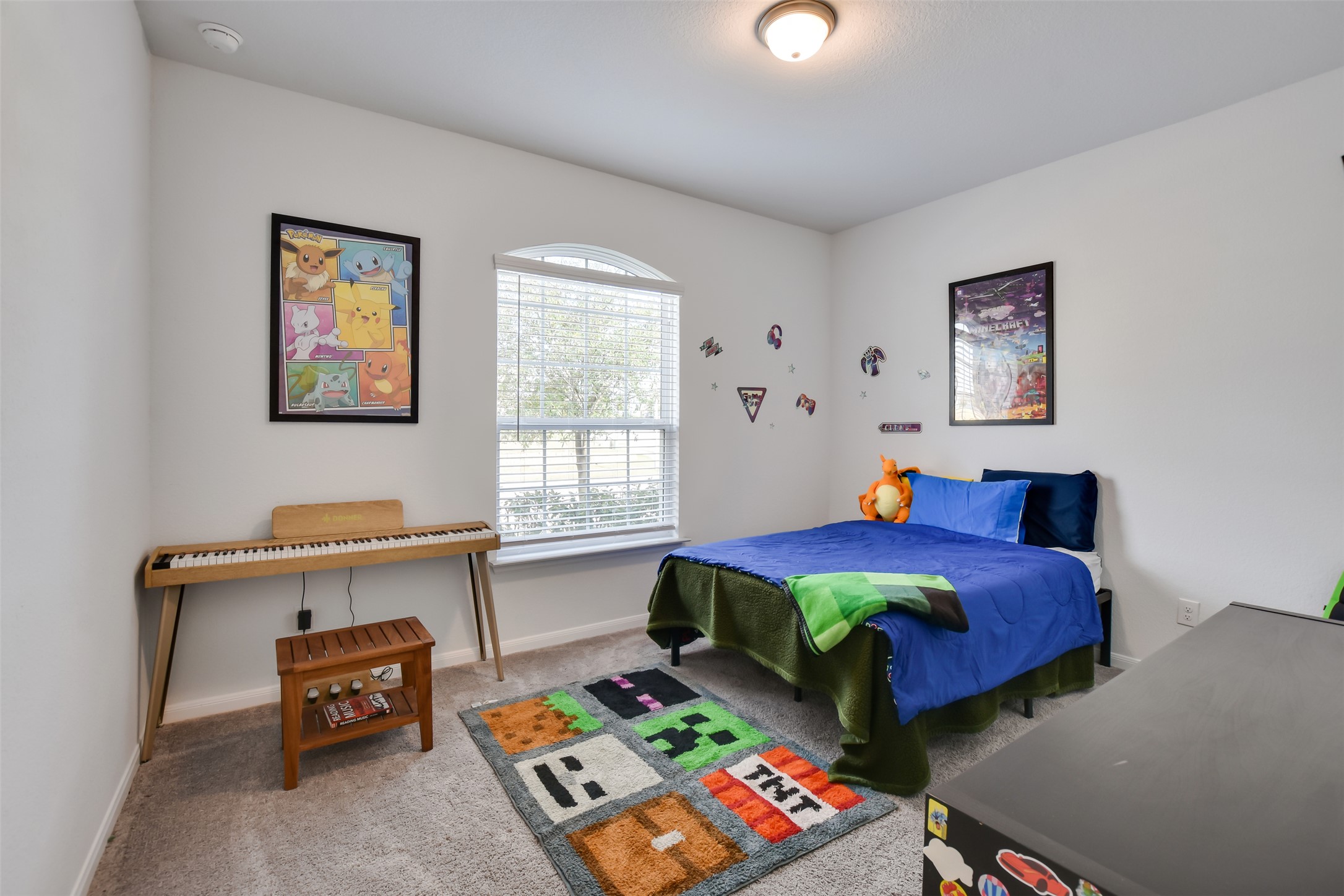 605 Oleander Loop Buda, TX 78610 - Photo 20 of 32 a bedroom with bed and a window