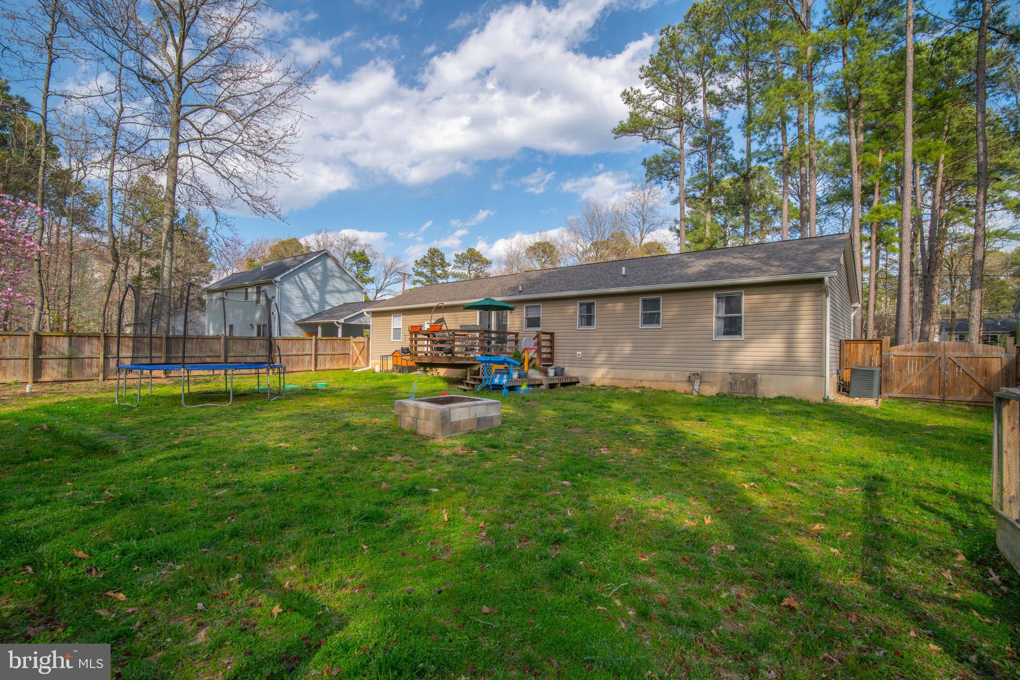 11543 San Rafael Road Lusby, MD 20657 - Photo 18 of 20 a view of a house with a yard