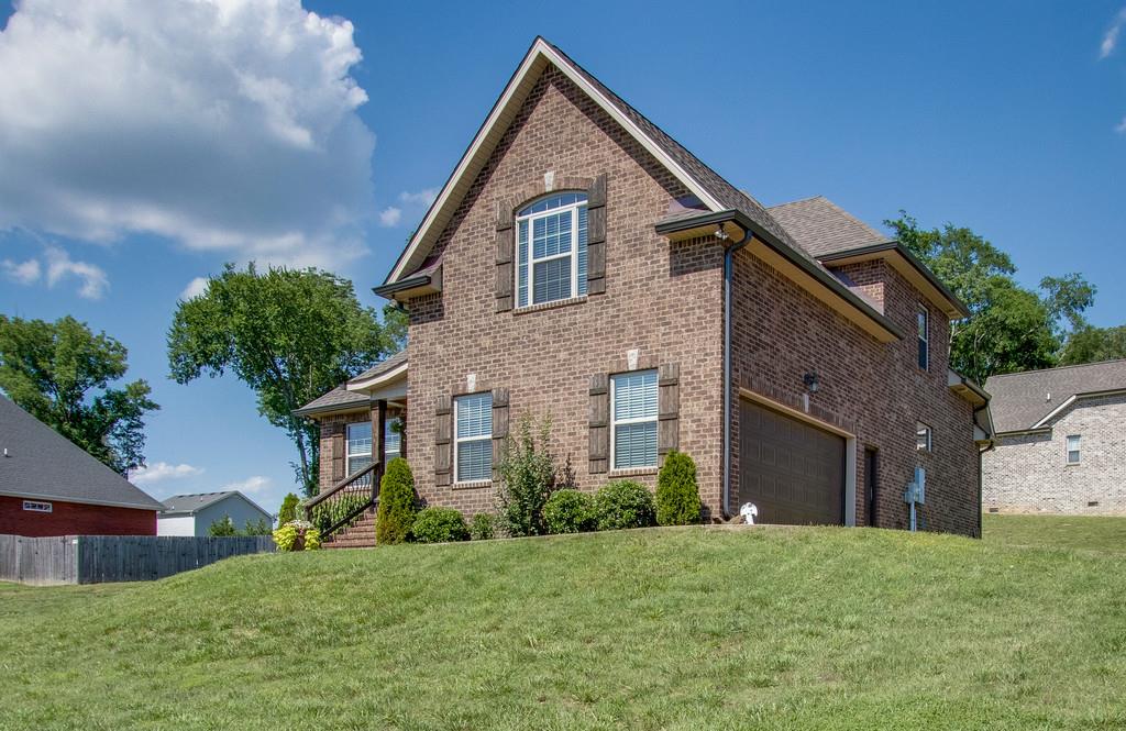 11 Remington Road Lebanon, TN 37090 - Photo 2 of 29 a front view of a house with a yard and garage