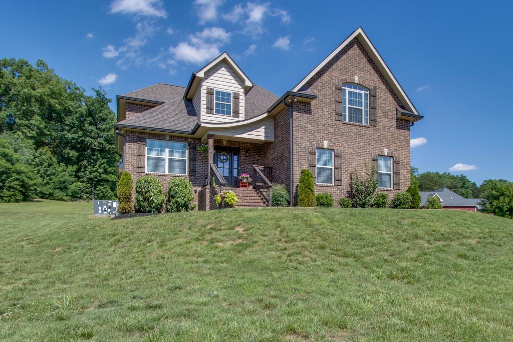 11 Remington Road Lebanon, TN 37090 - Photo 3 of 29 a front view of a house with a yard and garage