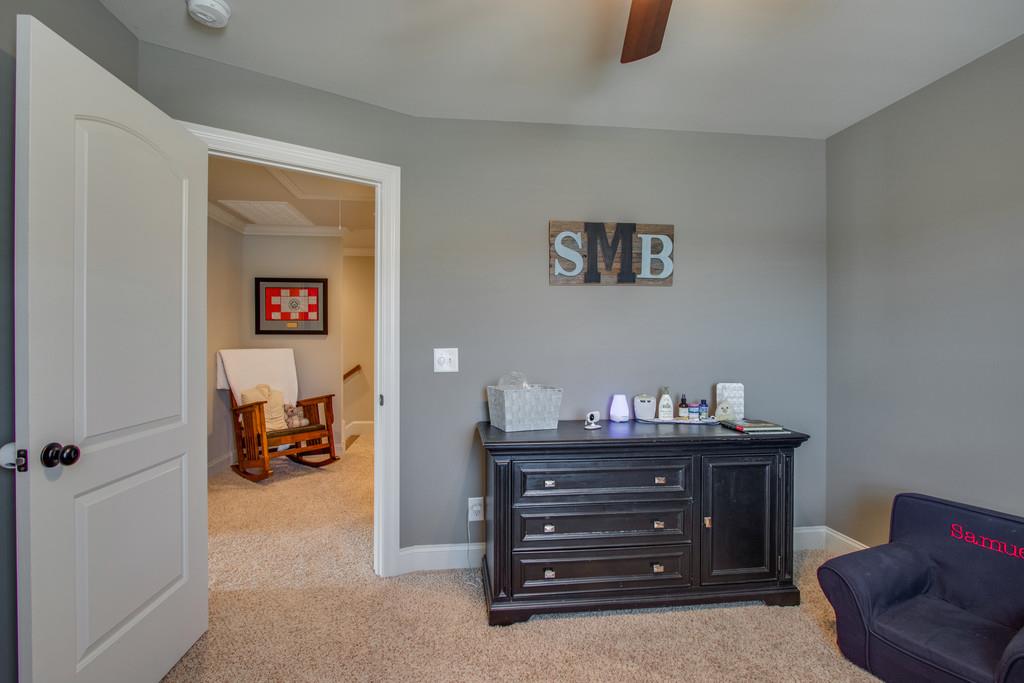 11 Remington Road Lebanon, TN 37090 - Photo 23 of 29 a bed room with a bed and a couch