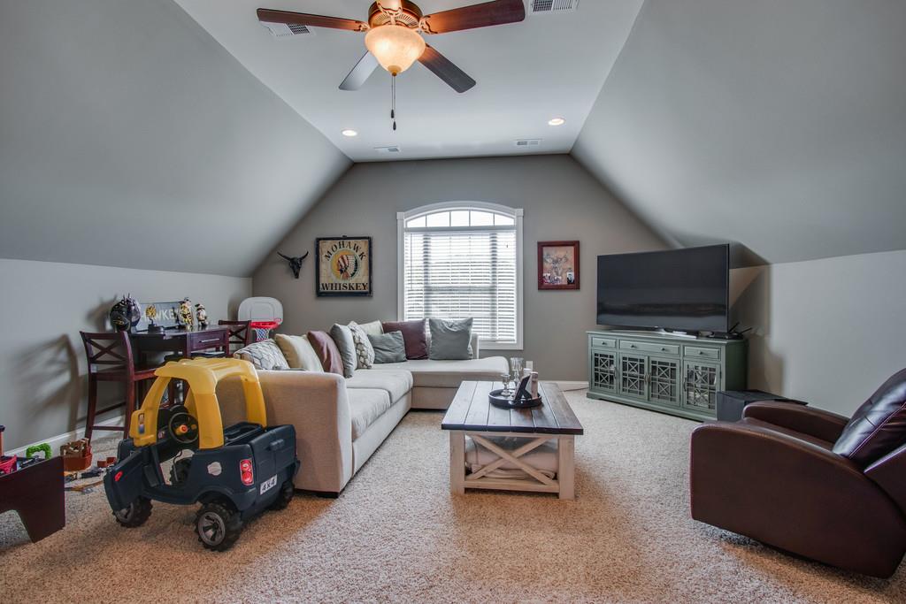 11 Remington Road Lebanon, TN 37090 - Photo 24 of 29 a living room with furniture and a flat screen tv