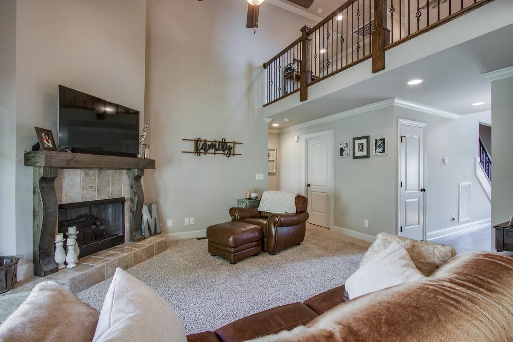 11 Remington Road Lebanon, TN 37090 - Photo 10 of 29 a living room with furniture a flat screen tv and a fireplace