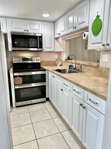$89,000 | 9201 Lime Bay Boulevard, Unit 214, Tamarac, FL 33321