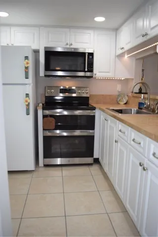 $89,000 | 9201 Lime Bay Boulevard, Unit 214, Tamarac, FL 33321