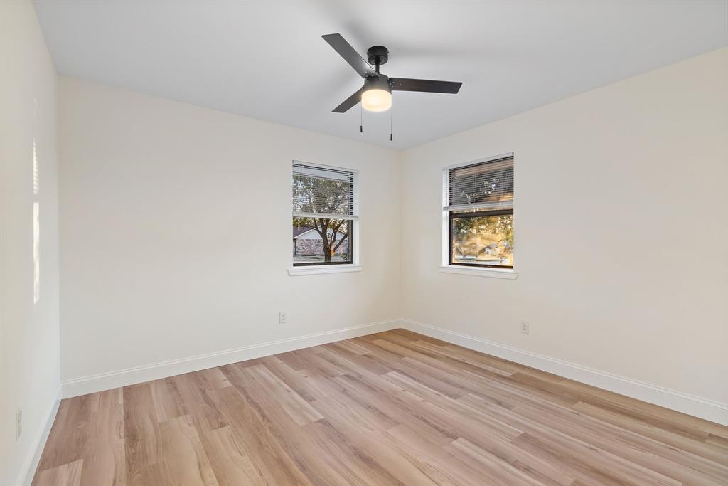 403 East 8th Street Prosper, TX 75078 - Photo 18 of 34 a view of empty room with wooden floor