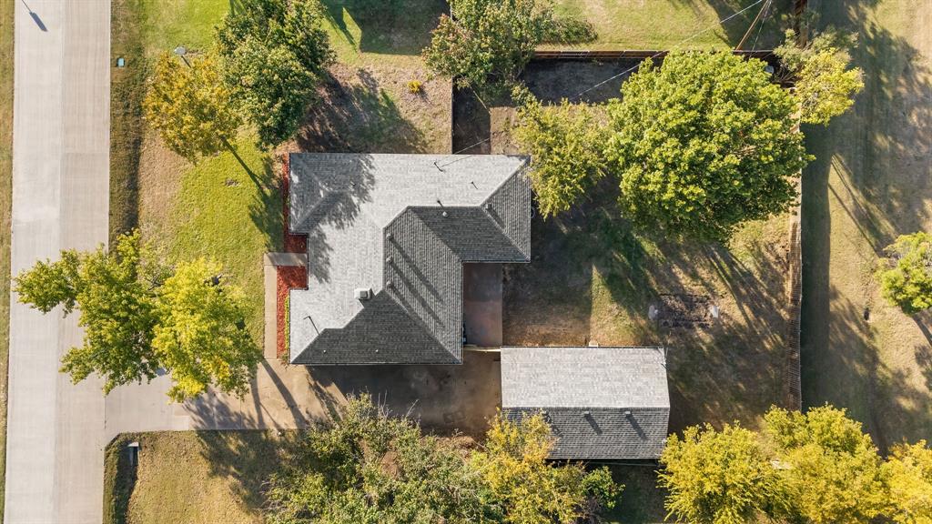 403 East 8th Street Prosper, TX 75078 - Photo 20 of 34 an aerial view of a house with a yard