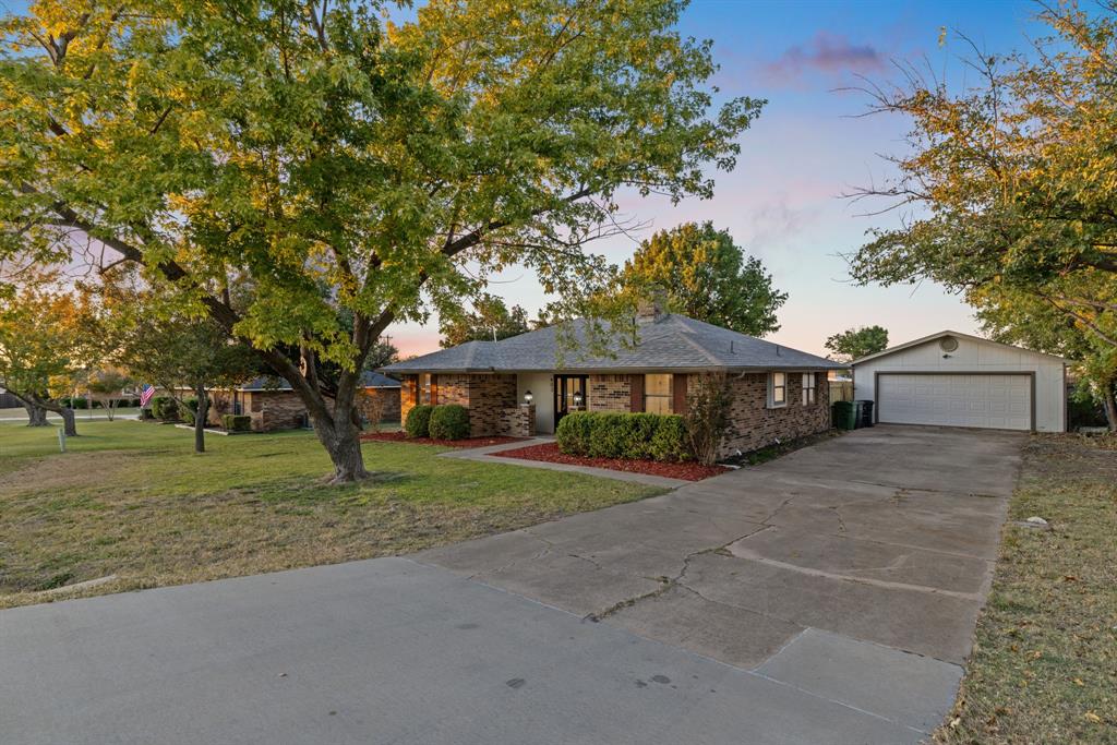 403 East 8th Street Prosper, TX 75078 - Photo 21 of 34 a view of a house with a yard and tree s