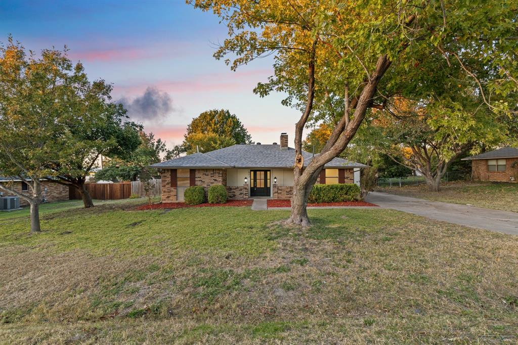 403 East 8th Street Prosper, TX 75078 - Photo 23 of 34 a view of a house with a yard
