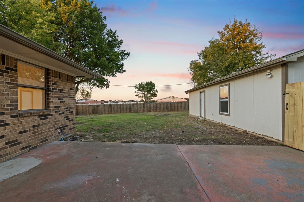 403 East 8th Street Prosper, TX 75078 - Photo 24 of 34 a view of a house with backyard and trees