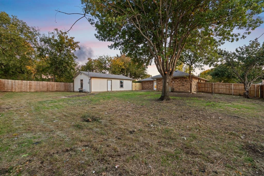 403 East 8th Street Prosper, TX 75078 - Photo 26 of 34 a view of a house with backyard and tree