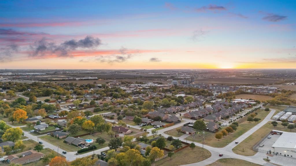 403 East 8th Street Prosper, TX 75078 - Photo 28 of 34 an aerial view of residential building with green space