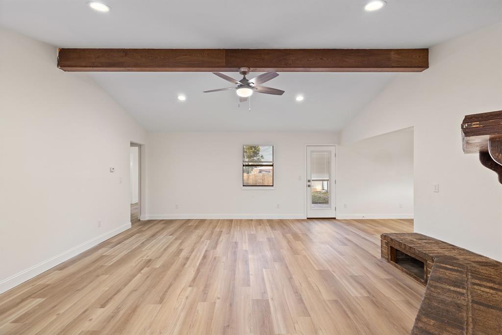 403 East 8th Street Prosper, TX 75078 - Photo 4 of 34 wooden floor in an empty room