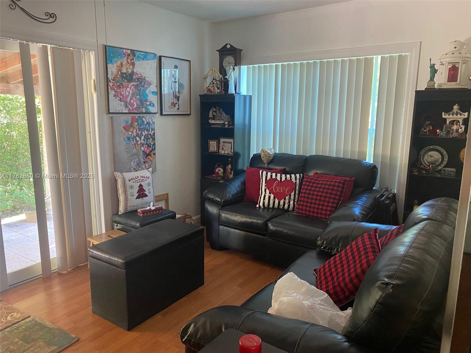 6331 Southwest 17th Street West Miami, FL 33155 - Photo 20 of 42 a living room with furniture and a window