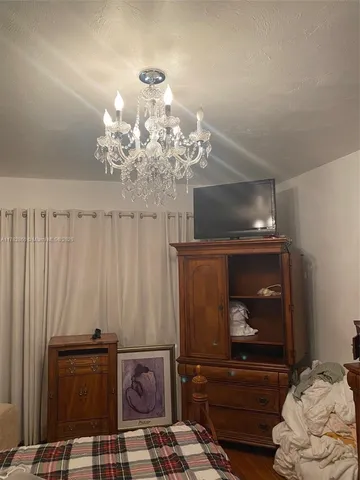 a bathroom with a sink a mirror and a toilet