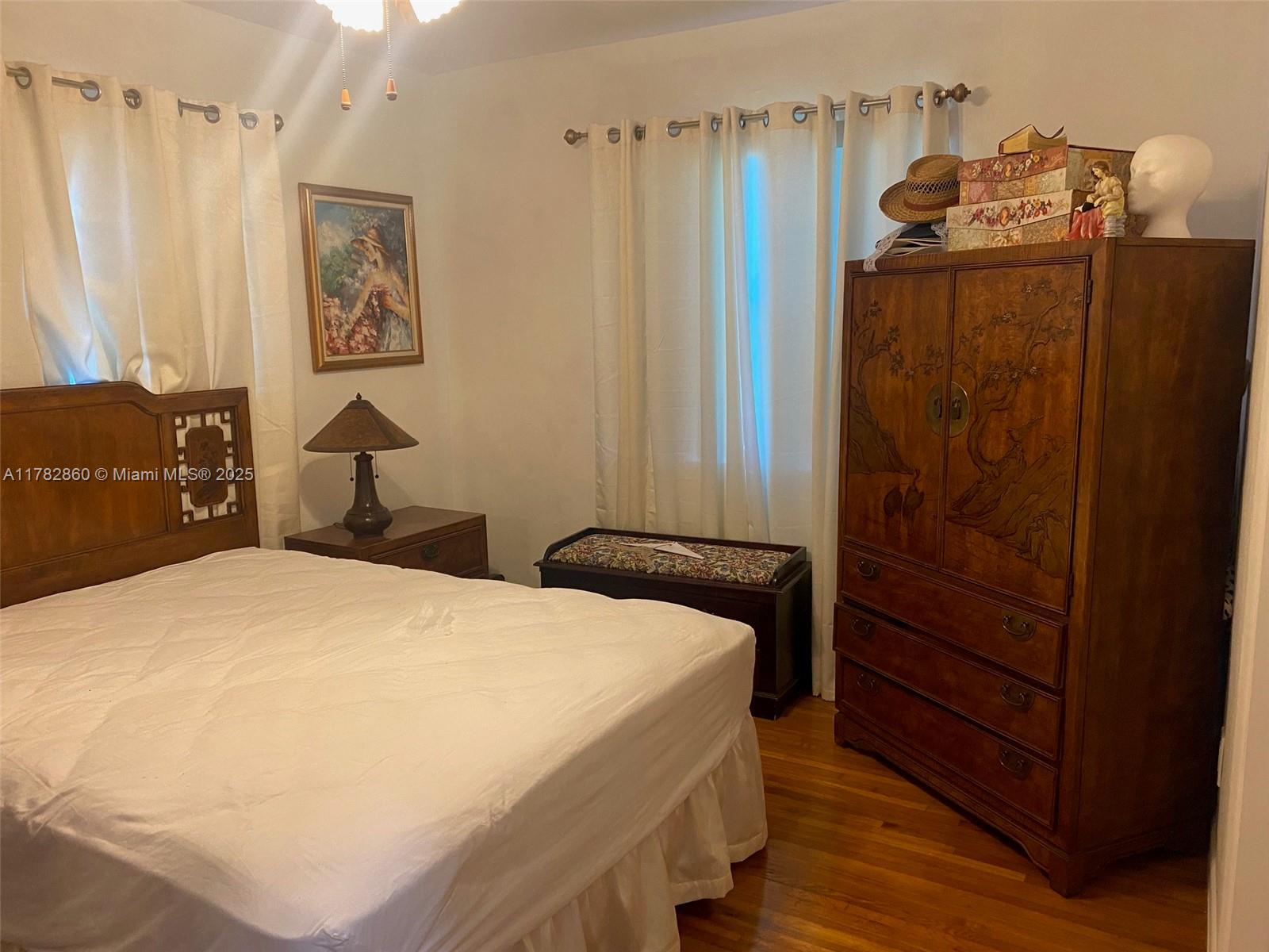 6331 Southwest 17th Street West Miami, FL 33155 - Photo 40 of 42 a bedroom with a bed and furniture