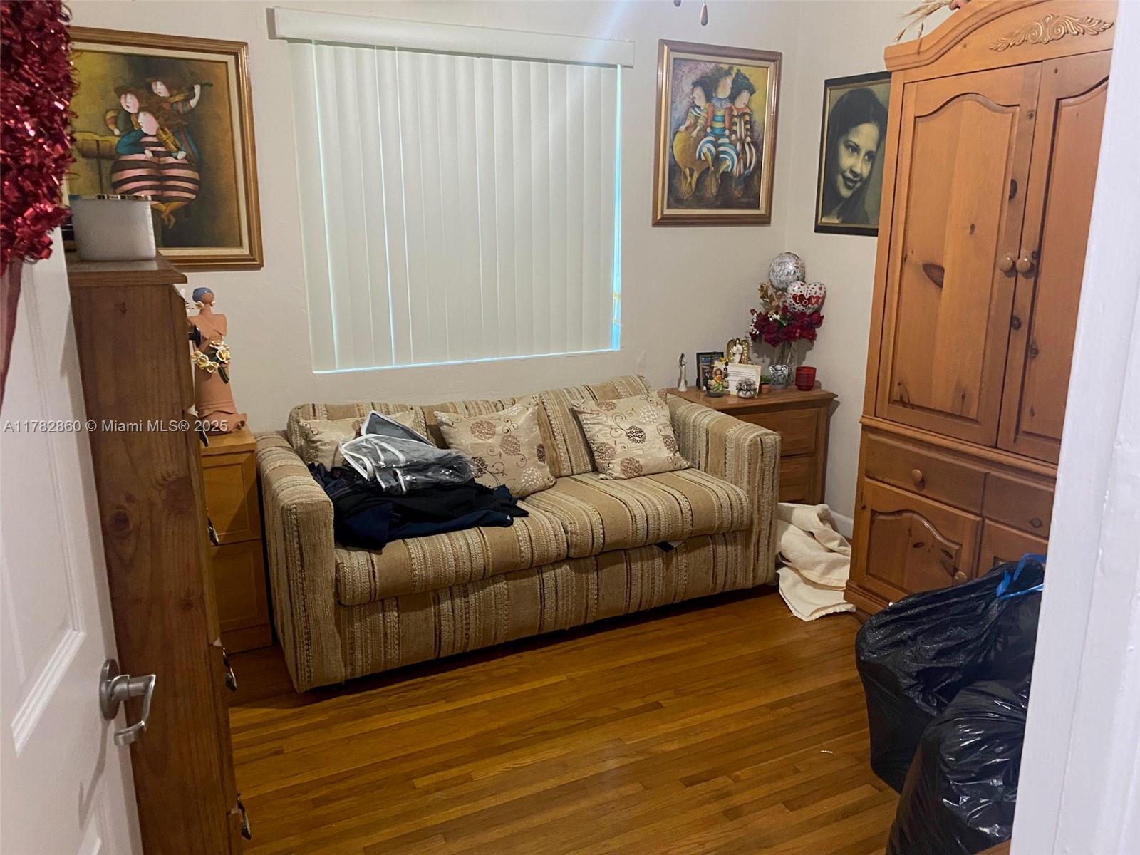 6331 Southwest 17th Street West Miami, FL 33155 - Photo 42 of 42 a living room with furniture and a window