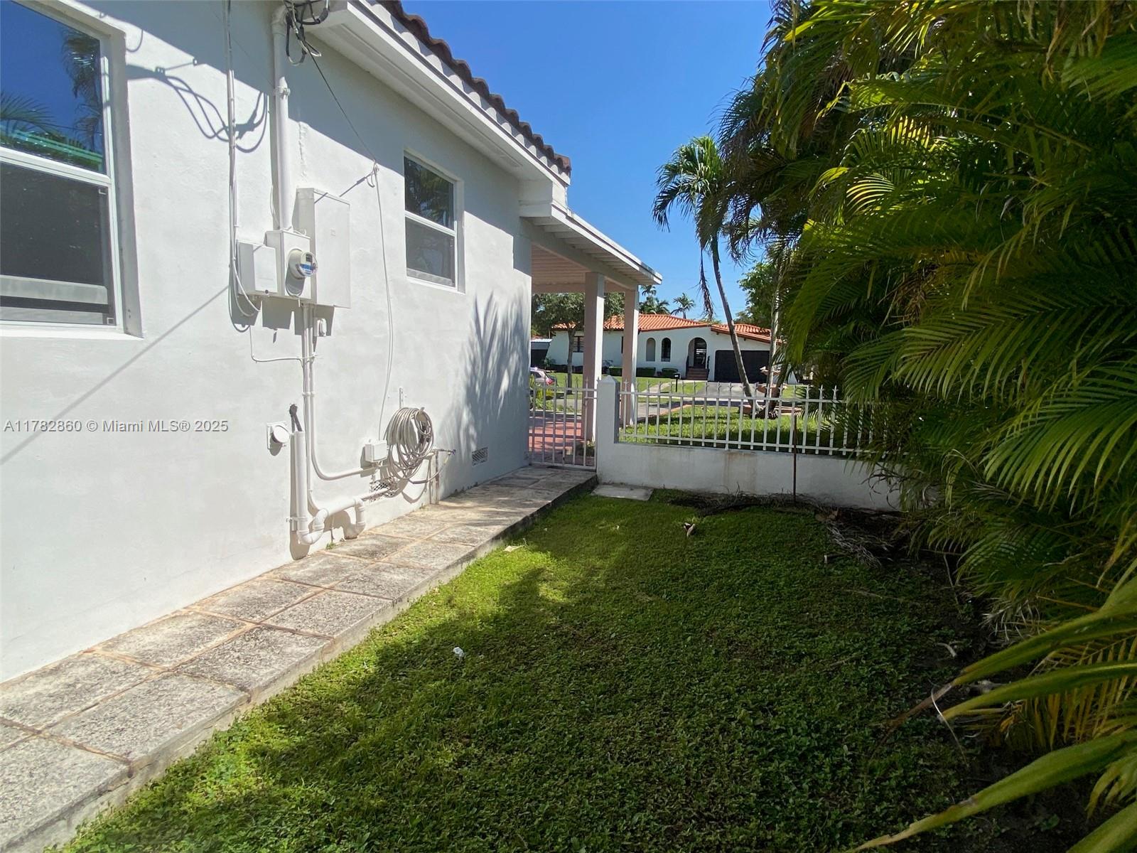 6331 Southwest 17th Street West Miami, FL 33155 - Photo 7 of 42 a house view with a backyard space