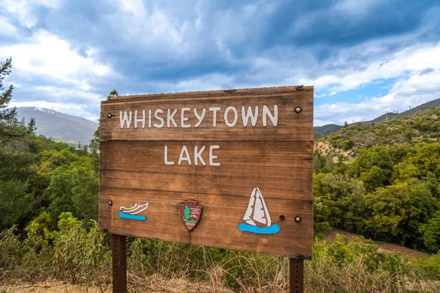 a view of a lake with a building in the background