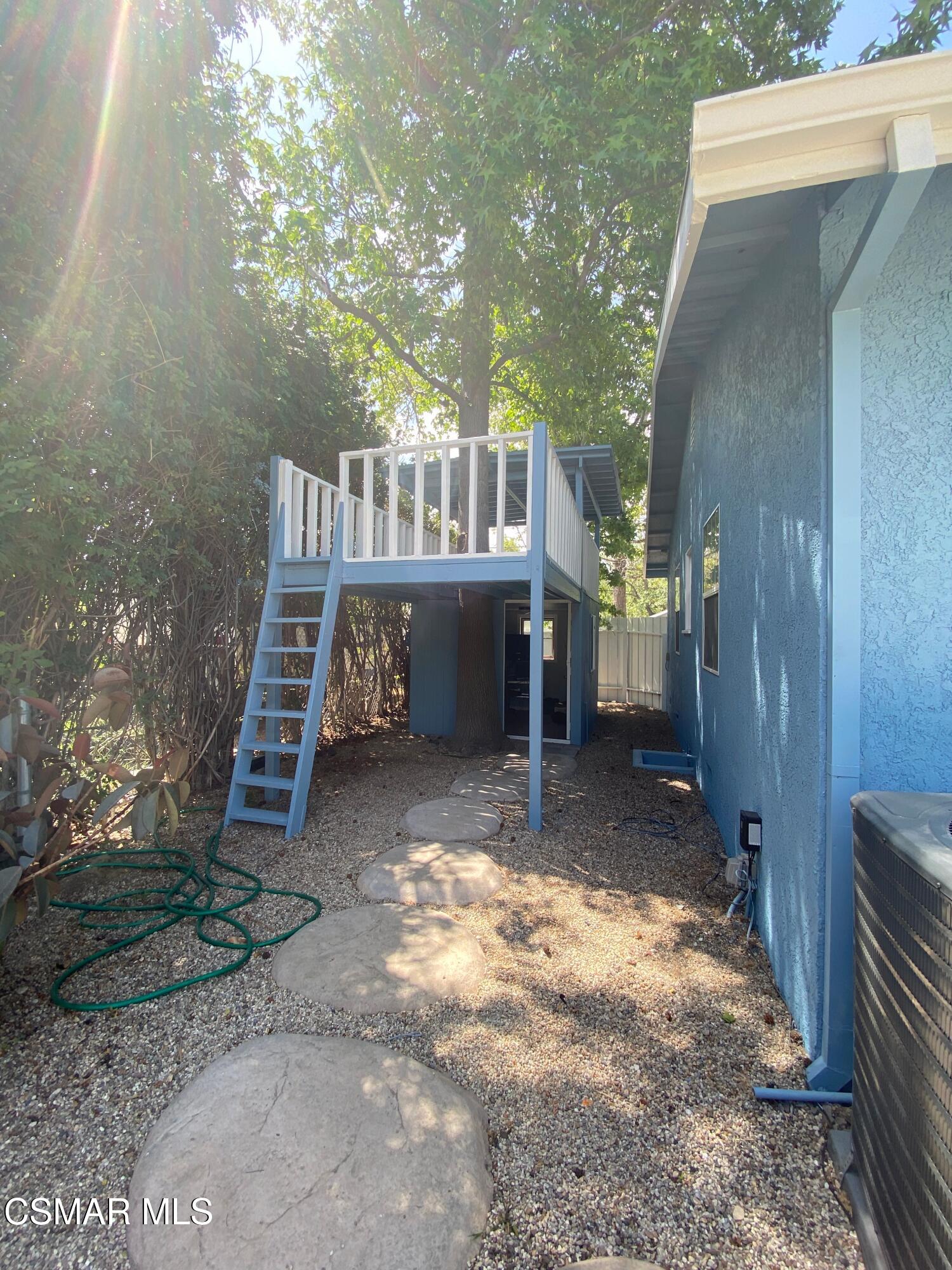4511 Barnard Street Simi Valley, CA 93063 - Photo 25 of 25 a view of a house with a yard