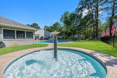 a view of a house with a swimming pool