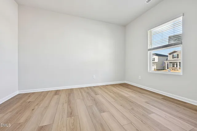 a empty room with a window