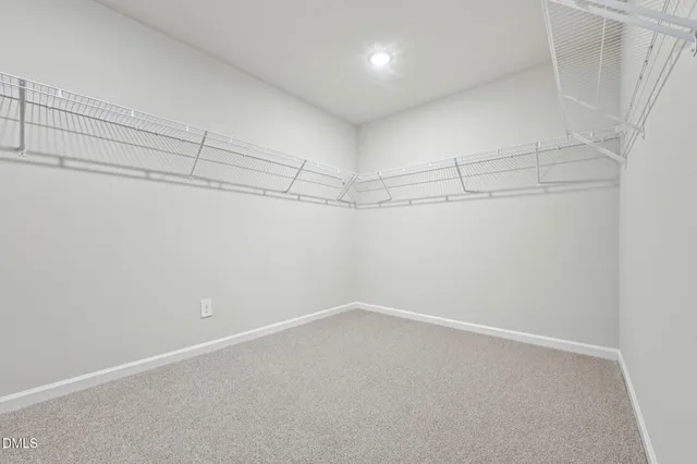 a view of a room with racks on the wall