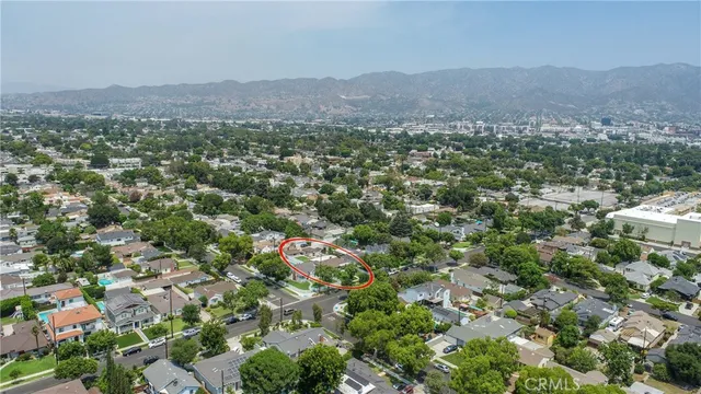 an aerial view of residential house and outdoor space