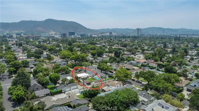 an aerial view of a city with lots of residential buildings