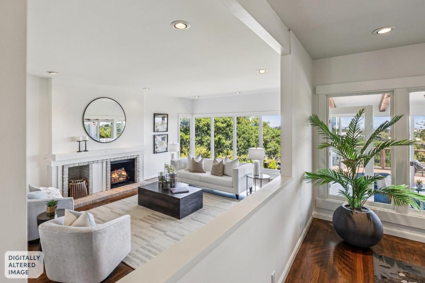 720 Endfield Way Hillsborough, CA 94010 - Photo 13 of 76 a living room with furniture a fireplace and a potted plant
