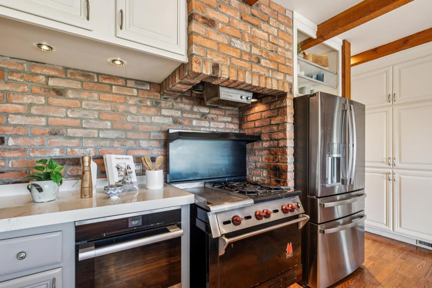 720 Endfield Way Hillsborough, CA 94010 - Photo 24 of 76 a kitchen with stainless steel appliances a stove and a refrigerator