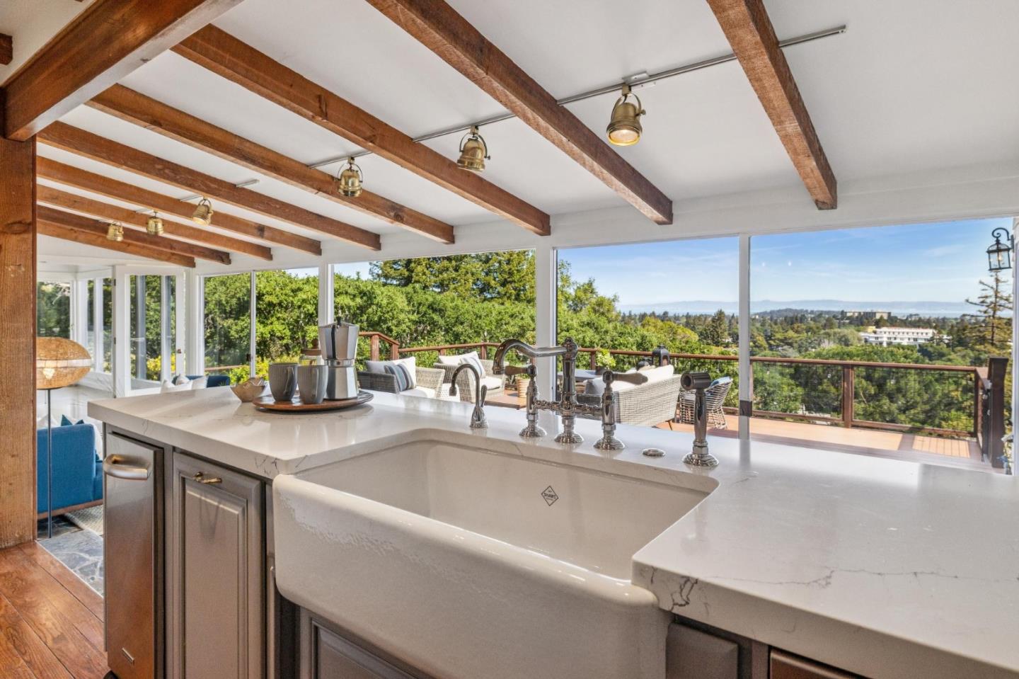 720 Endfield Way Hillsborough, CA 94010 - Photo 25 of 76 a room with a large window and table