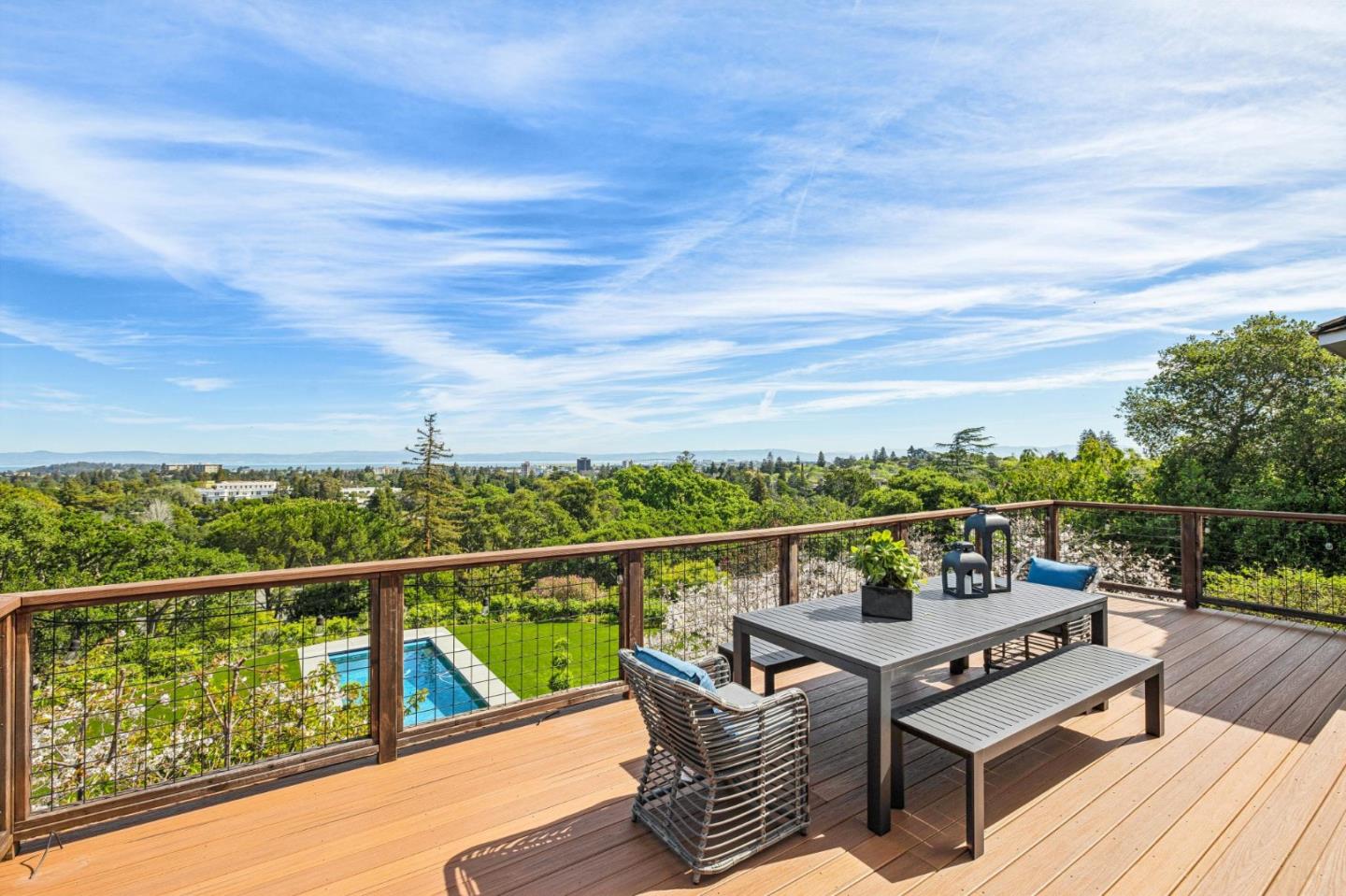 720 Endfield Way Hillsborough, CA 94010 - Photo 51 of 76 a view of a roof deck with couches and wooden floor