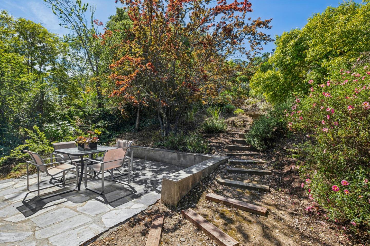 720 Endfield Way Hillsborough, CA 94010 - Photo 67 of 76 a view of a chairs and table in the outdoor