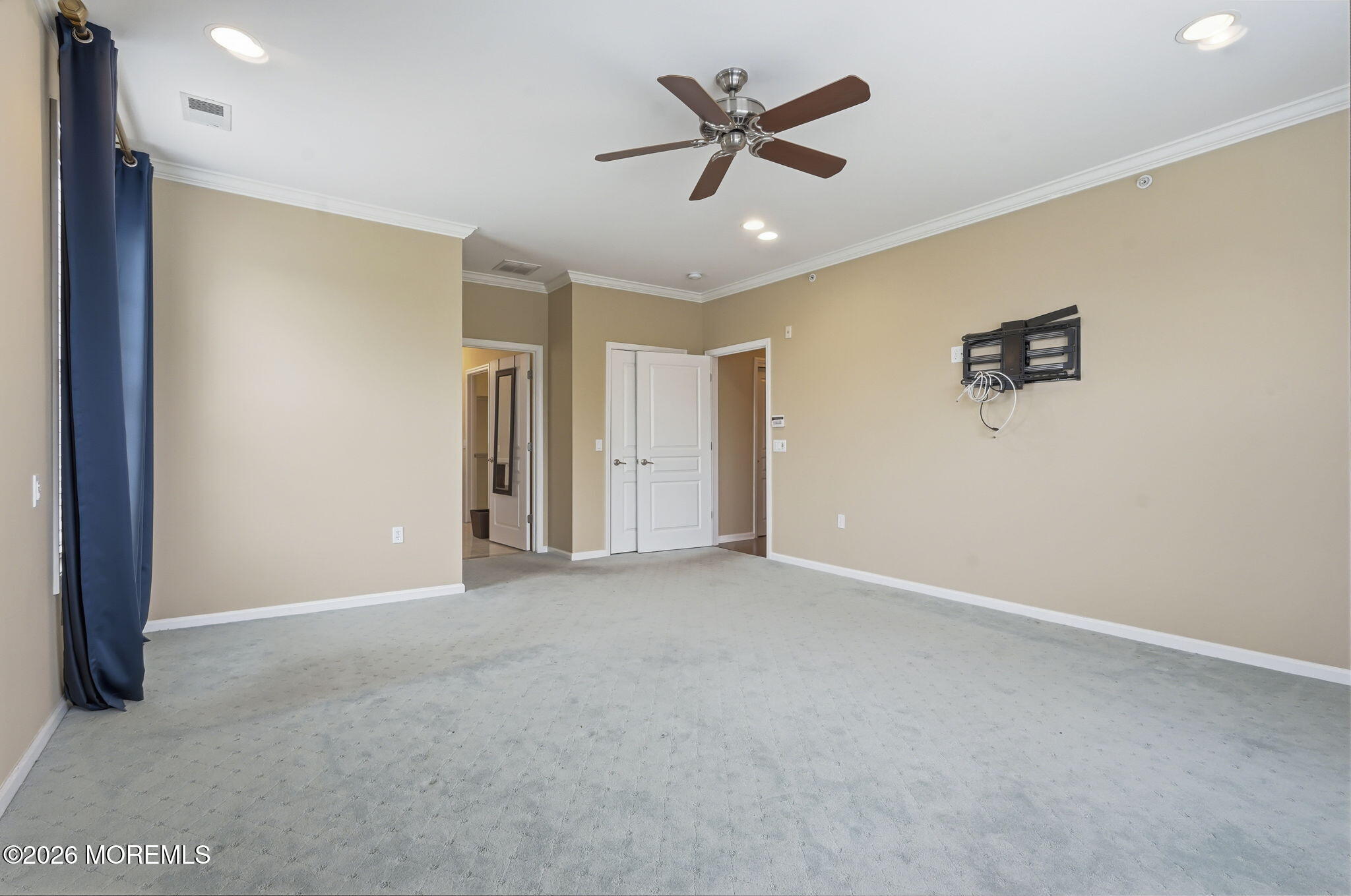 106 Potts Road Morganville, NJ 07751 - Photo 12 of 25 a view of a livingroom with a ceiling fan