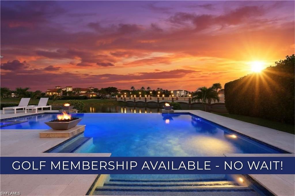 a view of swimming pool with furniture