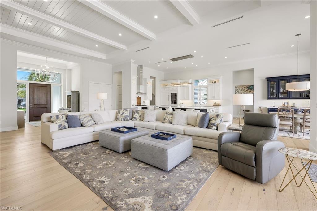 16415 Seneca Way Naples, FL 34110 - Photo 12 of 50 a living room with furniture and a couch