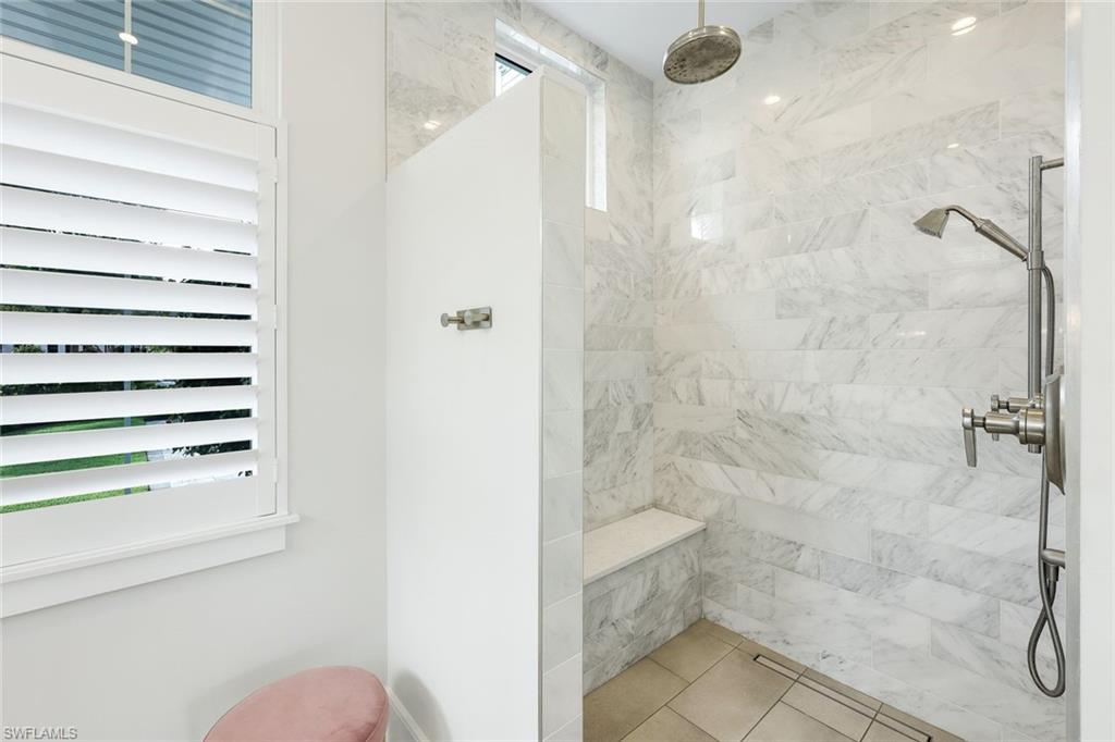 16415 Seneca Way Naples, FL 34110 - Photo 27 of 50 a bathroom with a shower