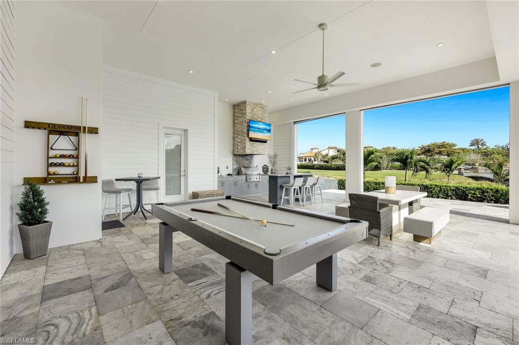 16415 Seneca Way Naples, FL 34110 - Photo 39 of 50 a view of a living room and dining room
