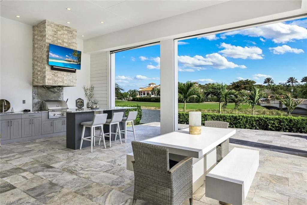 16415 Seneca Way Naples, FL 34110 - Photo 40 of 50 a view of a dining room with furniture window and outside view