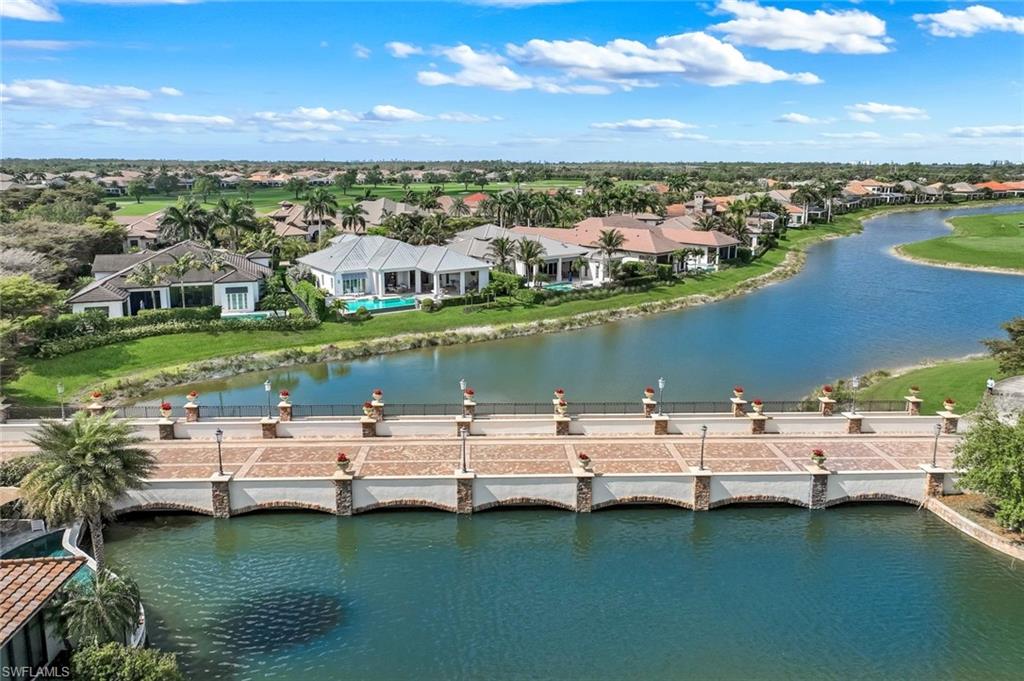 16415 Seneca Way Naples, FL 34110 - Photo 49 of 50 a view of a city with lawn chairs