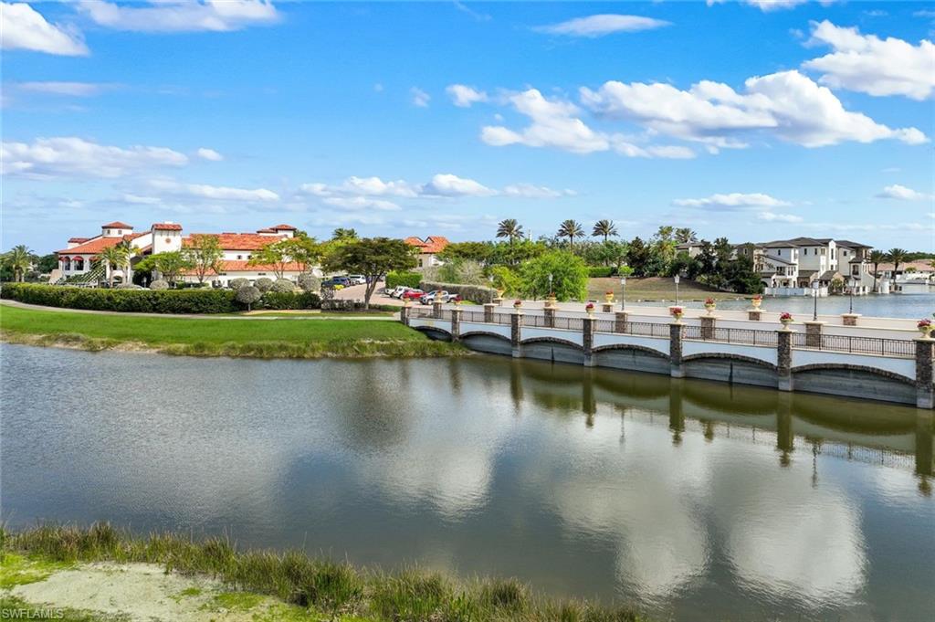 16415 Seneca Way Naples, FL 34110 - Photo 50 of 50 a view of a lake with a city